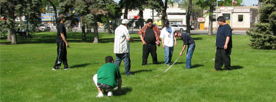 Students practice their mathematics and measurement skills in St. John's Park, across Main Street from the centre.